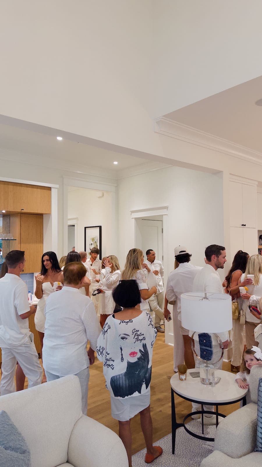 A room dressed in white, the evening already in motion